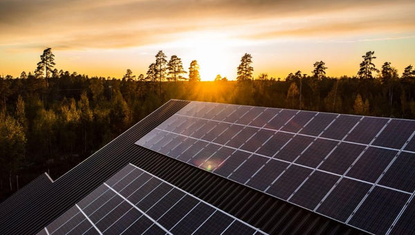 aerial view of a house with roof solar cells