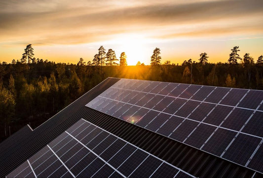 aerial view of a house with roof solar cells